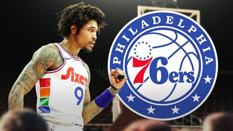 Kelly Oubre Jr. goes down hard after a dunk over Yves Missy