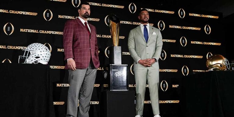 Notre Dame’s Marcus Freeman gets some advice from old Ohio State coach Jim Tressel