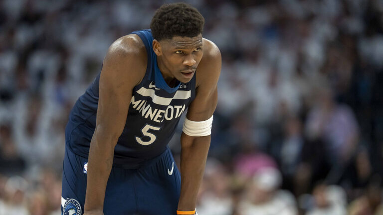 Anthony Edwards throws the ball in Shai Gilgeous-Alexander