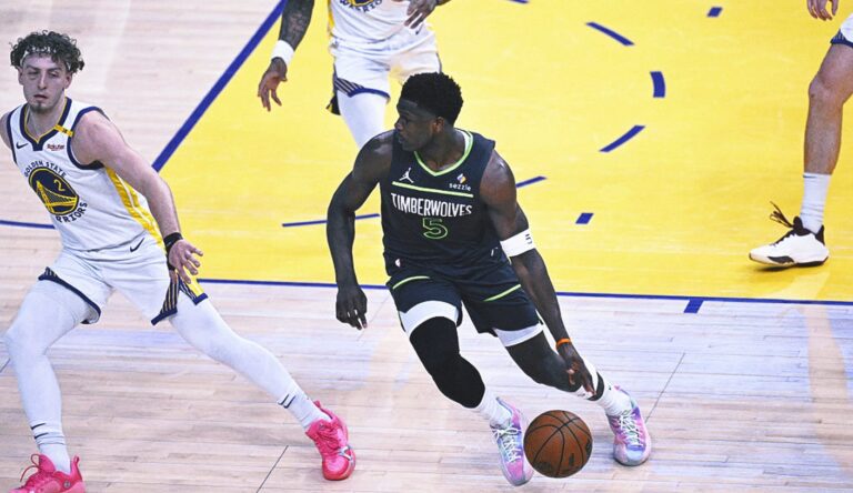 Anthoni Edwards scores 28 2. Half points for lead wooden plates next to warriors