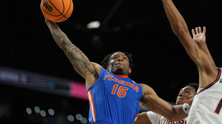 Aliah Martin lights up the summer league with a massive dunking of poster