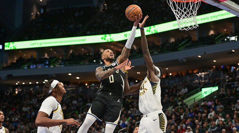 GIF response Damian Lillard on Giannis-Miles Turner report