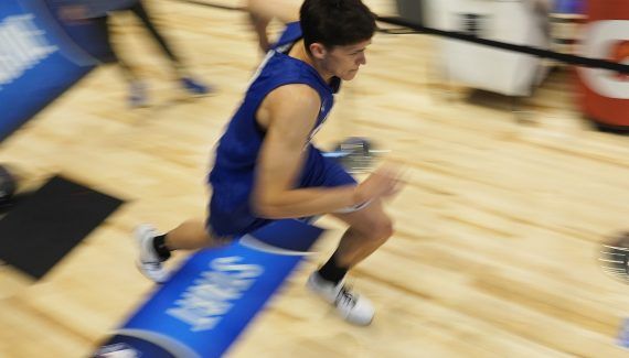 Egor Demin is expected in a bodybuilding room