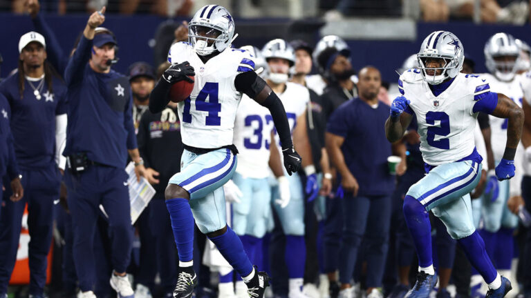 Markquese Bell takes blocked packages into the house