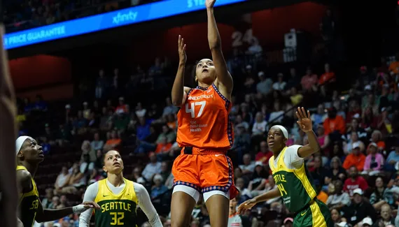 Leila Lacan, Janelle Salaun and Dominique Malonga in AP All-Rookie Team