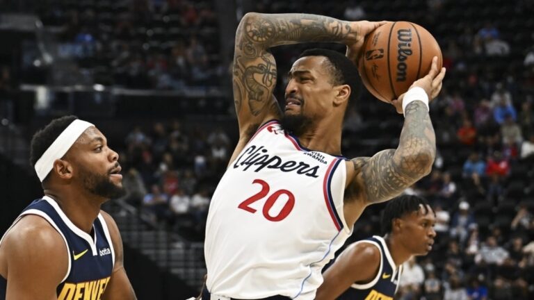 John Collins reacts to the opening night back-to-back game against the Jazz