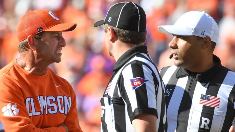 Dabo Sweeney is penalized after tearing the referees