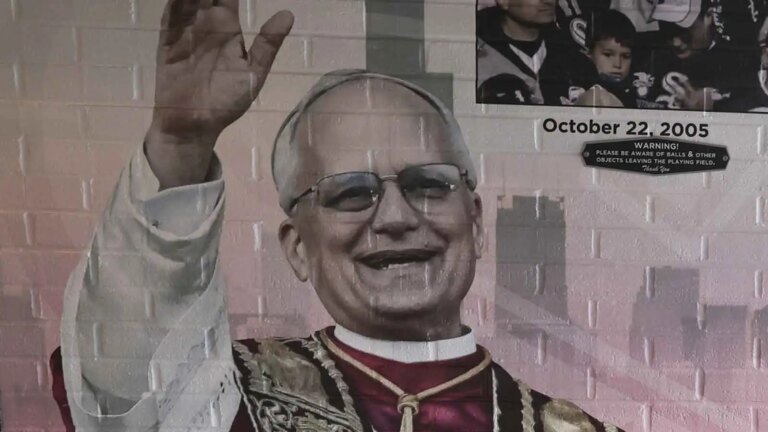 Pope Leo XIV receives a Chicago jersey from Chuck Svirski