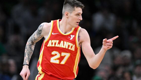 Whit Krejci listened intently to Quin Snyder