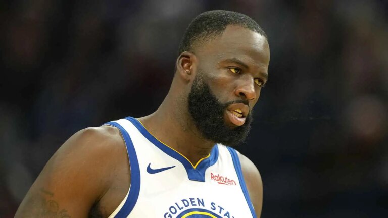 Draymond Green remains on the bench after a clash with Steve Kerr