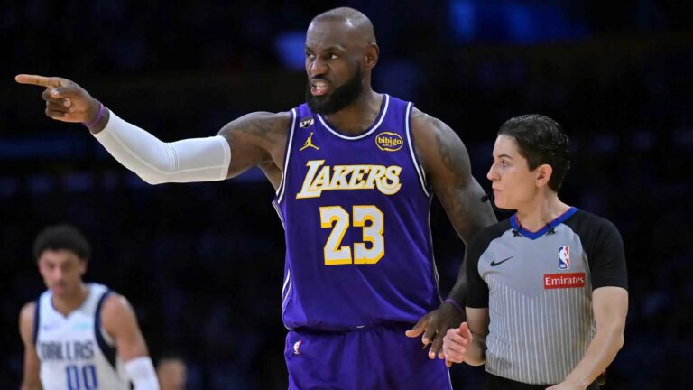 LeBron James catches a stray pass from Ron Harper