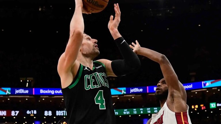 Nikola Vucevic goes to work for Boston in his debut against the Heat