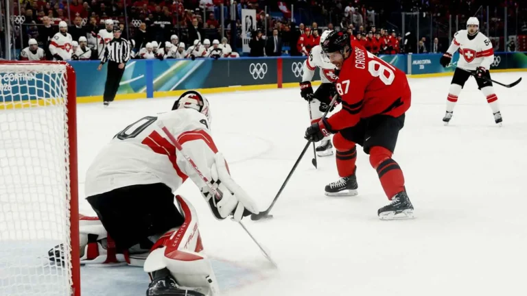 Sydney Crosby of the Penguins scores a sweet re-direct goal for Team Canada against Switzerland