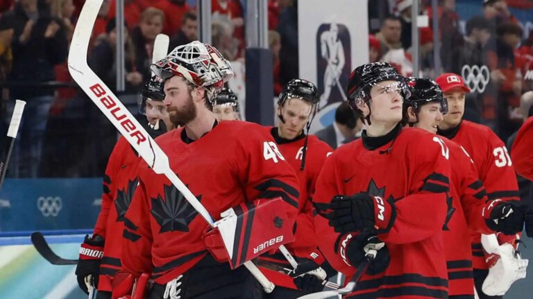 Fans throw beer glasses onto the ice during the Switzerland vs Canada clash