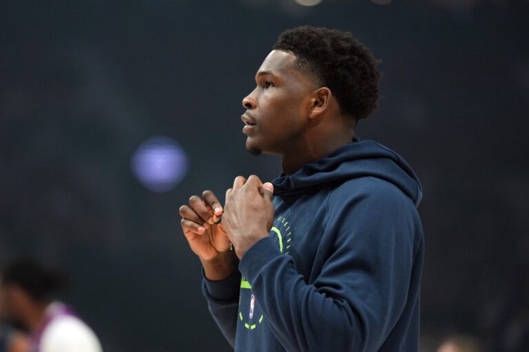 Anthony Edwards and Desmond Bain check out