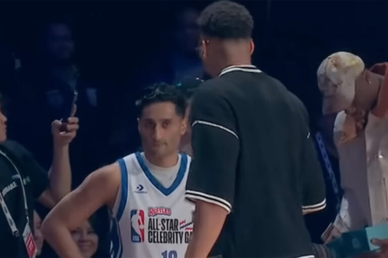 Giannis Antetokounmpo is enjoying his little revenge against Shams Charania at the Celebrity Game