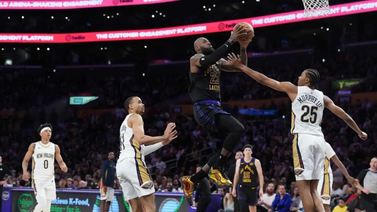 LeBron James asks a reporter a question after LA lost for the first time since 2009